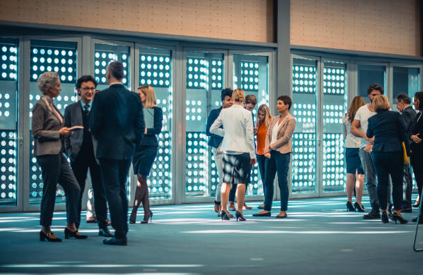 istock Business people at a conference event 1276785947