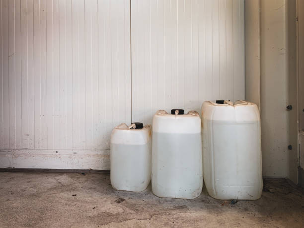 istock 3 white canisters of different sizes are filled with liquid 1276786092