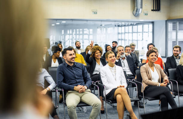 istock Business people at a conference event 1276788193