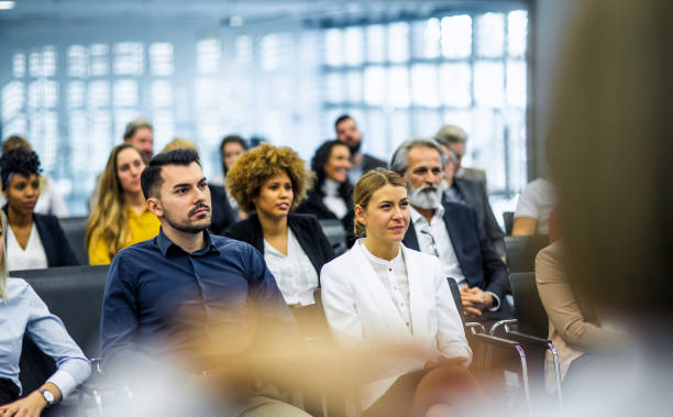 istock Business people at a conference event 1276788519