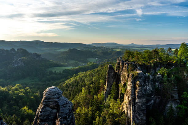 istock rocks in saxon switzerland at sunrise, germany 1276789258