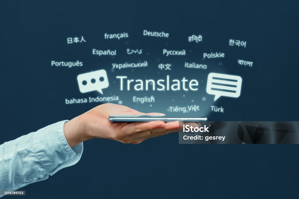 The concept of a program for translating in a smartphone from different languages The concept of a program for translating in a smartphone from different languages. Translation Stock Photo