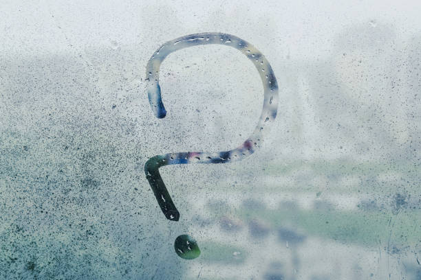 istock A question mark painted on wet glass 1276789754