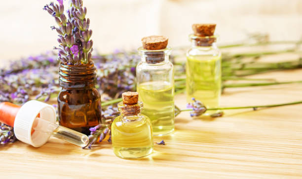 istock Lavender essential oil in a small bottle. Selective focus. 1276789956