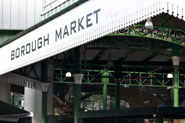 Food shopping in London Borough Market in London is a shop for locals and an attraction
for tourists borough market stock pictures, royalty-free photos & images