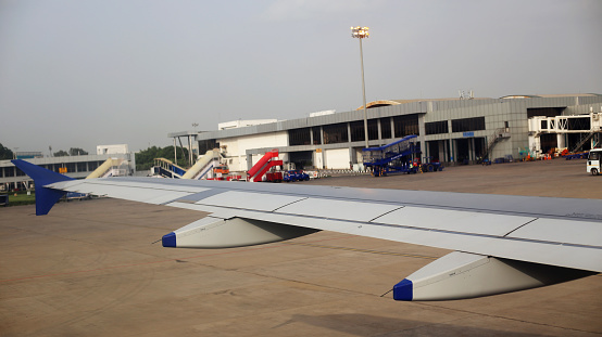 Ahmedabad, India, August 04, 2018 : Airplane standing at Indira Gandhi International Airport. Indira Gandhi International Airport serves as the major international aviation hub of the Indian capital city of New Delhi as well as India.