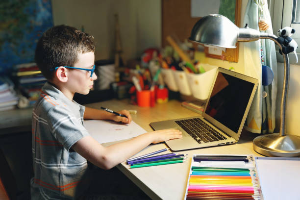 istock Home schooling distance learning child online education 1276801916