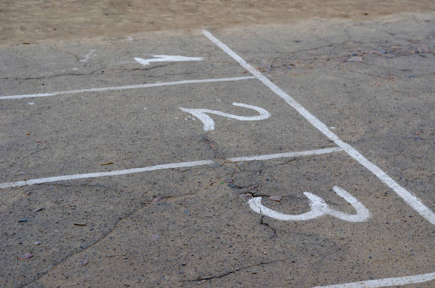 istock White lines and numbers 1, 2, 3 on the asphalt. 1276802356