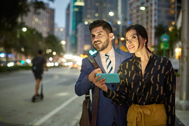 istock Miami Business Partners Watching for Crowdsourcing Taxi 1276803945