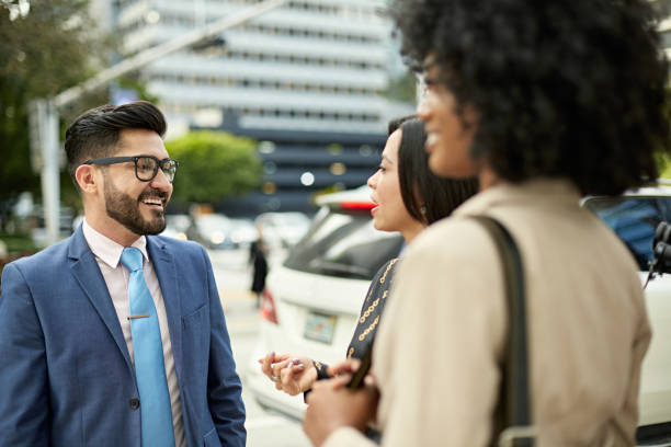 istock Multi-Ethnic Business Associates Talking in Downtown Miami 1276803983