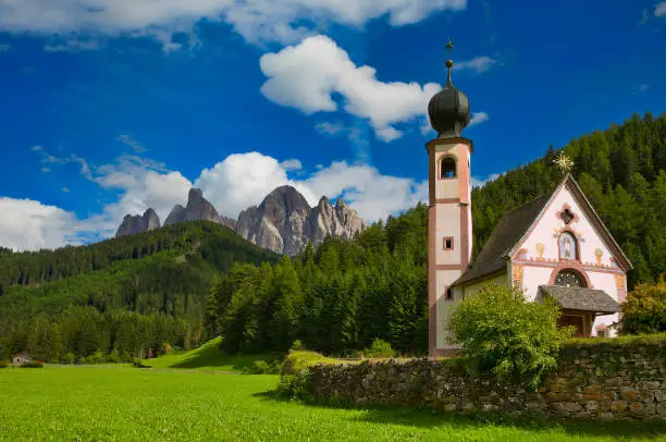 Beautiful church of St John of Nepomuk (Chiesetta di San Giovanni) in Ranui, Val di Funes, Dolomites, Italy