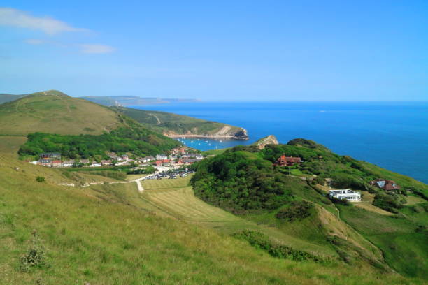 istock Lulworth Cove Bay, Dorset on a sunny day 1276808303