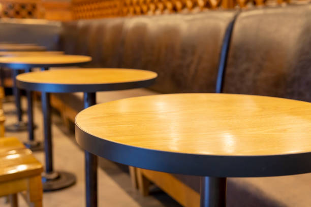 istock Close-Up Of Empty Tables and Chairs in a cafe 1276810958