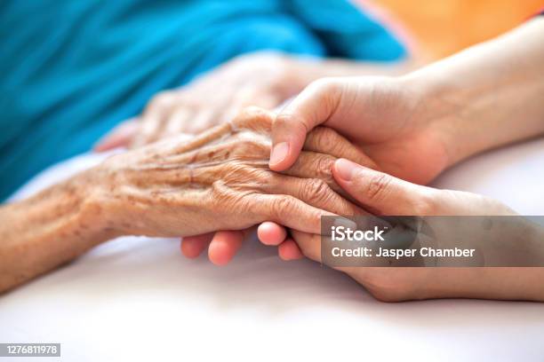 Helping The Needy Stock Photo - Download Image Now - Senior Adult, Nursing Home, Home Caregiver