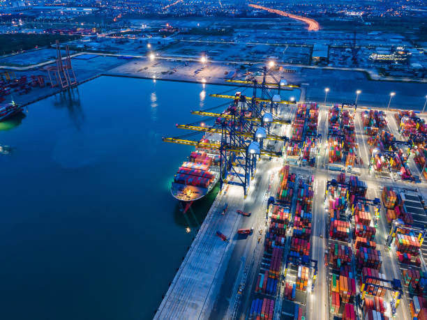 istock Container , container ship in export and import business and logistics. Shipping cargo to harbor by crane. Water transport International. Aerial view and top view. 1276812169