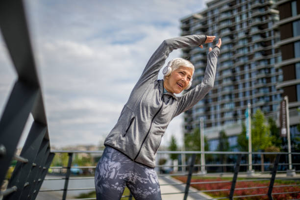 istock Active senior woman warming up  for jogging. 1276814859