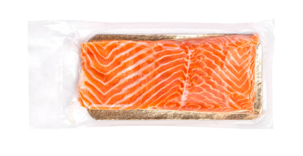 istock Vacuum packed salmon portion fillet isolated on white background, top view 1276815795