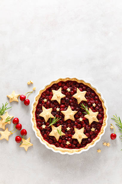 istock Homemade cherry pie, tart with star shaped cookies 1276815940