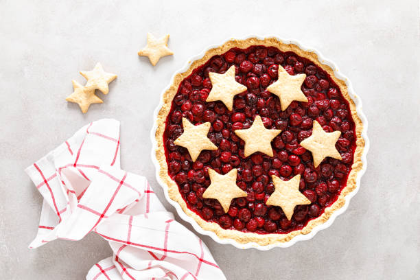 istock Homemade cherry pie, tart with star shaped cookies 1276816738