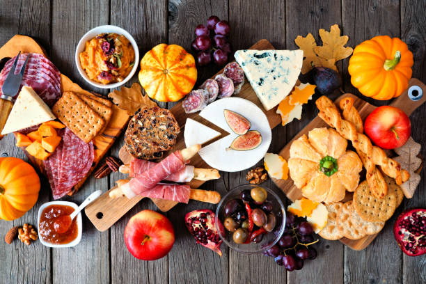 istock Fall charcuterie table scene against a dark wood background 1276819195