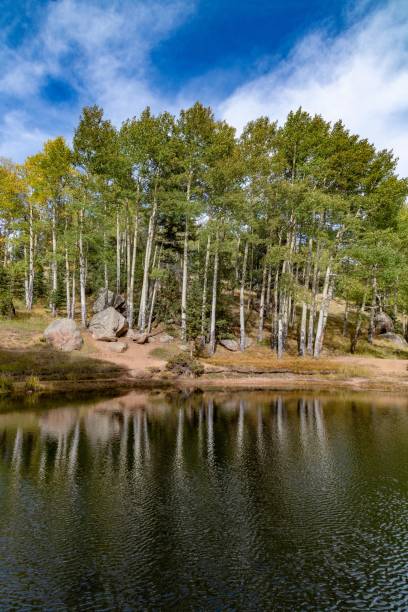 istock Colorado autumn colors with  pond with reflections 1276820397