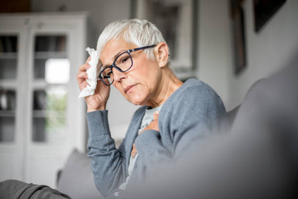 istock Sick senior woman with terrible lung pain. 1276823772
