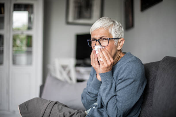 istock Sick senior woman at home. 1276824452