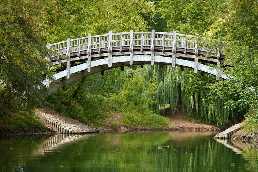 Wooden bridge to Marie Island in the Rotehornpark in Magdeburg