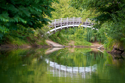 Wooden bridge to Marie Island in the Rotehornpark in Magdeburg