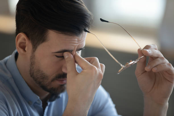 istock Unwell young man struggle with blurry vision 1276837785