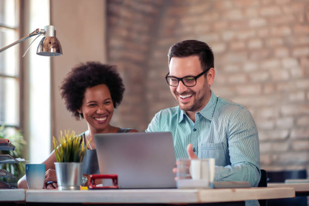 istock Image of two coworkers working together on new project 1276838826