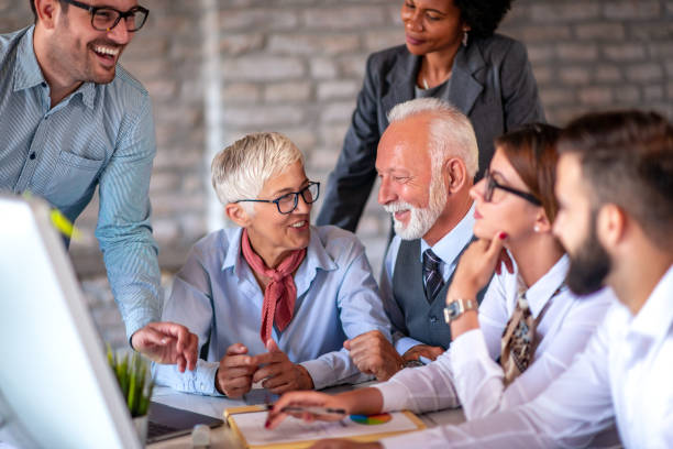 istock Group of business people working on business project 1276839472