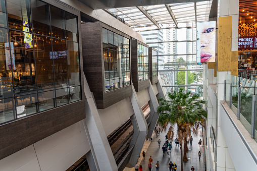 Passengers who just got off the train are walking out of the Chatswood train station, Sydney, Australia.