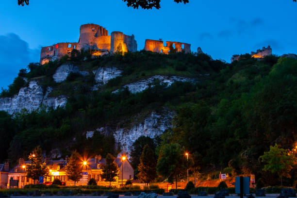 Erice, near Trapani in Sicily; view from Venus Castle at night. On the background, mount Cofano, and the lights of the town of Valderice