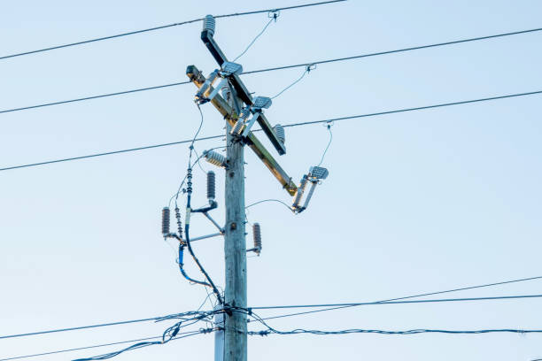 istock Wooden Power  Electrical Wires Pole With A Transformers. 1276855739