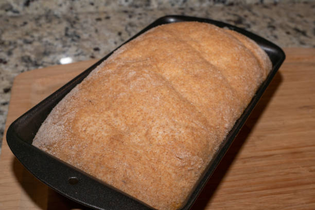 istock Homemade Wheat Bread Dough in a Pan 1276859650