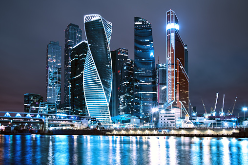 Night evening light architecture shot. High modern skyscrapers, international business center. Moscow City, Russia.