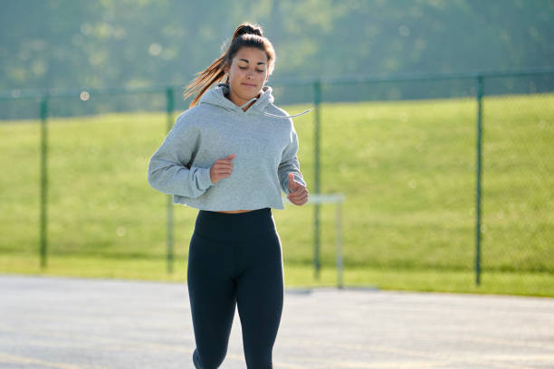 Beautiful and fit woman running