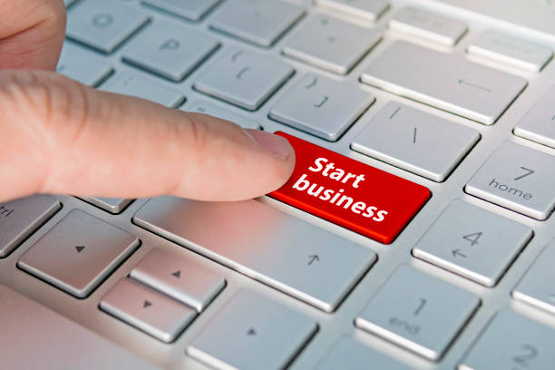 istock Commerce, Internet business, Start-up start business inscriptions on the grey silver keyboard button close up. 1276868581