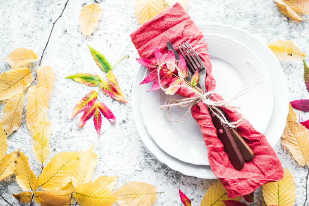 istock Thanksgiving autumn place setting with cutlery 1276868765