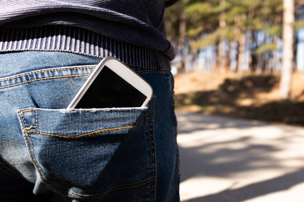 istock Phone in the pocket of jeans 1276868932