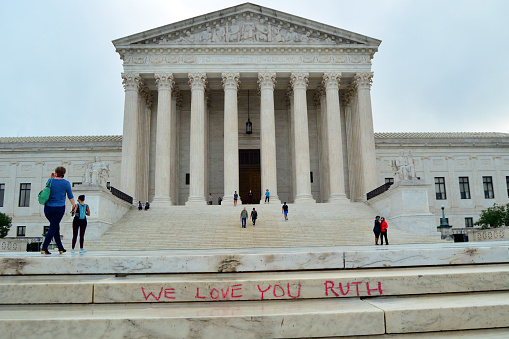 Washington DC, USA September 25, 2020 A well wisher leaves a note for the late Supreme Court Justice Ruth Bader Ginsburg on the steps of the United States Supreme Court in Washington, DC