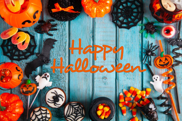 istock Halloween party decorations frame on blue wooden rustic table 1276876058