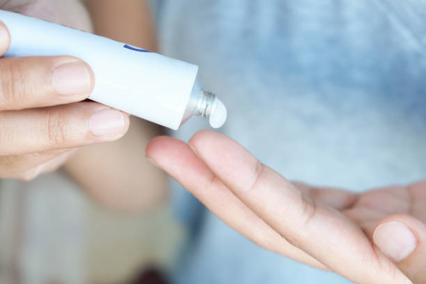 istock The woman's hand, she uses steroids Apply External type 1276884951