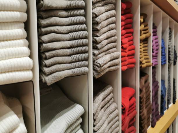 istock Colorful socks on shelves 1276889141