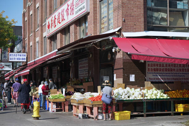 Toronto, Canada - September 25, 2020: Toronto has a large immigrant population and a large and colorful downtown ethnic shopping district, with Chinese stores with sidewalk displays.