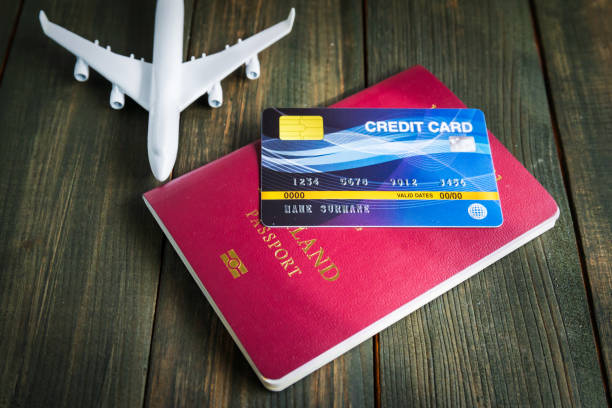 istock Credit card put on passport on wooden table 1276890848
