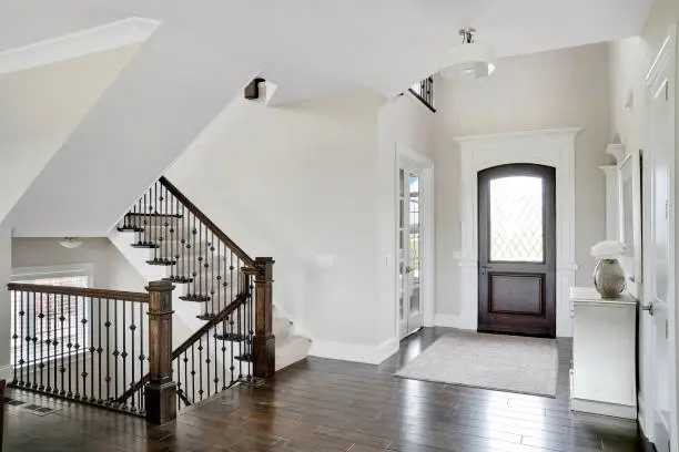 Photo of Gorgeous entryway with quick access to upstairs or downstairs