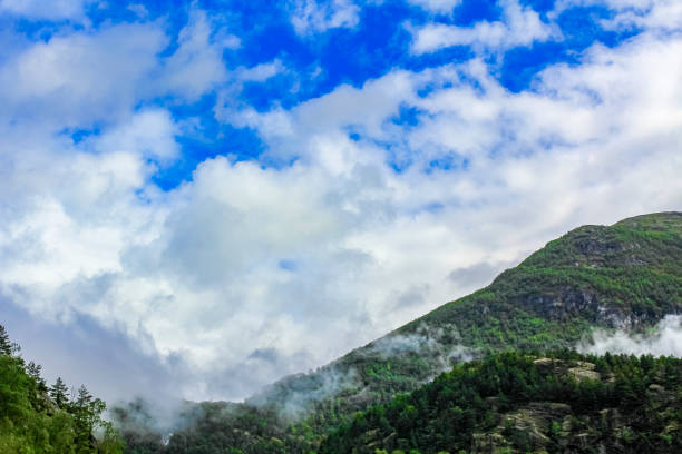 istock Clouds are flying above mountains in beautiful Hemsedal, Norway. 1276897069
