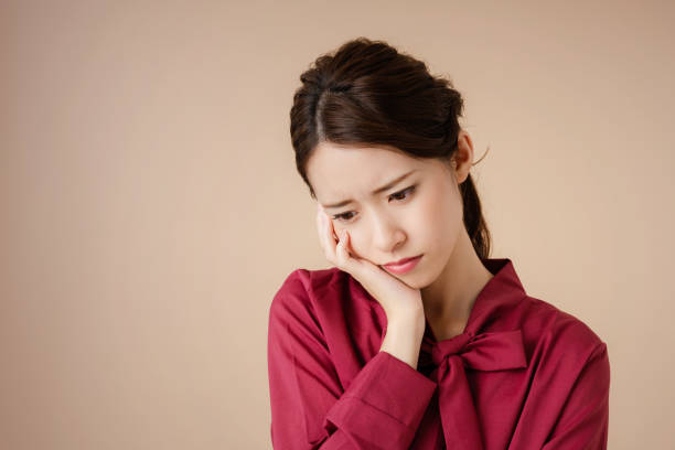 istock Confused young woman. 1276909199